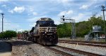 NS yard job E19 starts back up the hill with four cars received from CSX.  CSX signal and bungalows for the switch for the "switching lead" to Main 1 to the right.